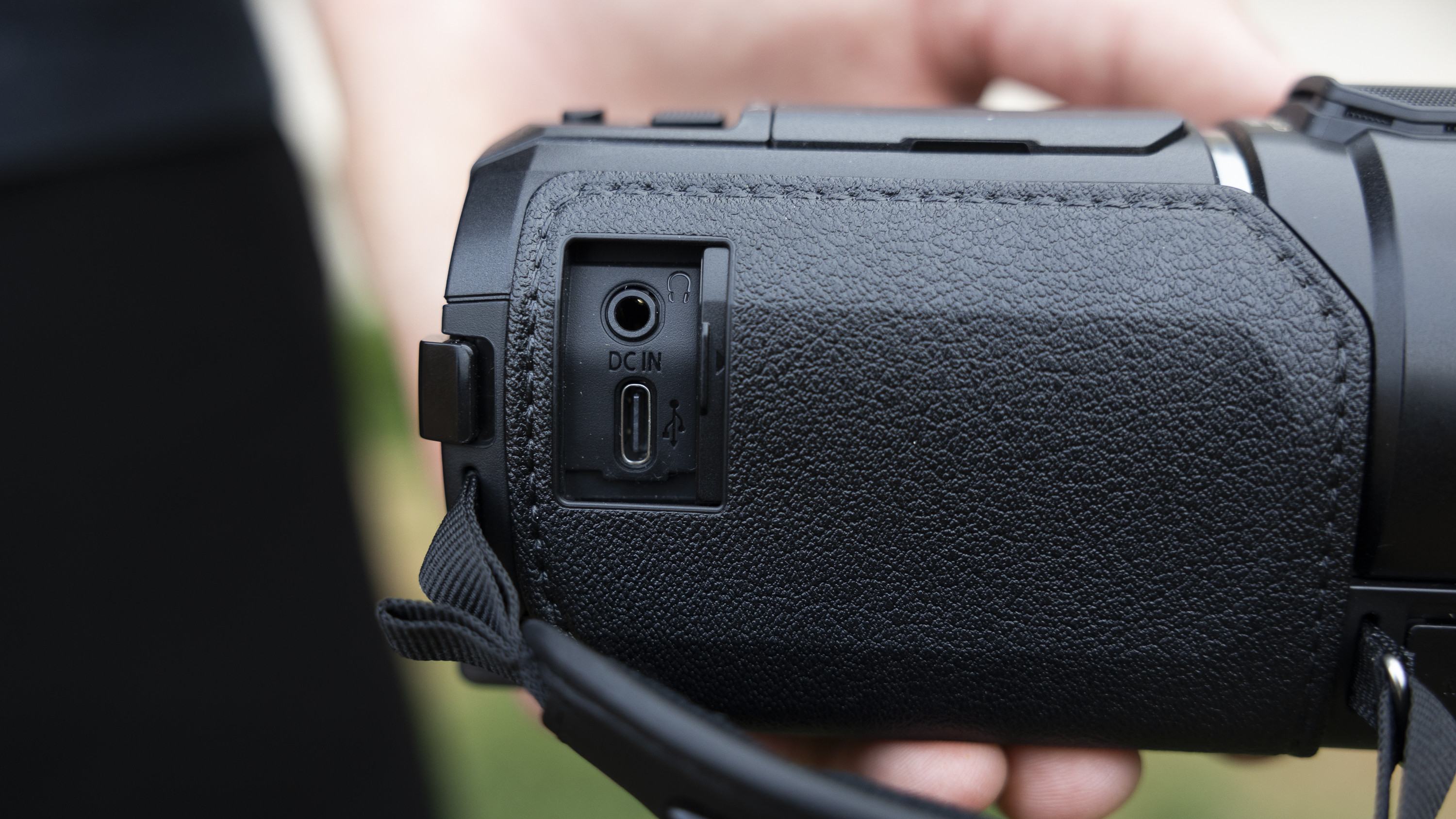 A side view of the Panasonic HC-V900 camcorder