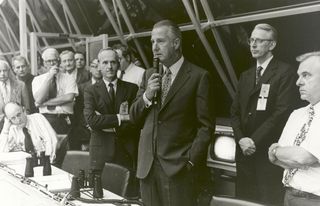 Requested by U.S. President Richard Nixon. Vice President, Spiro Agnew, headed up a "Space Task Group" to review the nation's space future. Shown here is Agnew congratulating the launch control team after liftoff of Apollo 17 in 1972. Earlier, Apollo 8 astronaut, Bill Anders, in June 1969 was appointed as executive secretary of the Space Council, with a mandate to revitalize the organization. But in early 1973, Nixon abolished the National Aeronautics and Space Council.
