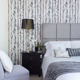 bedroom with birch wood wallpaper