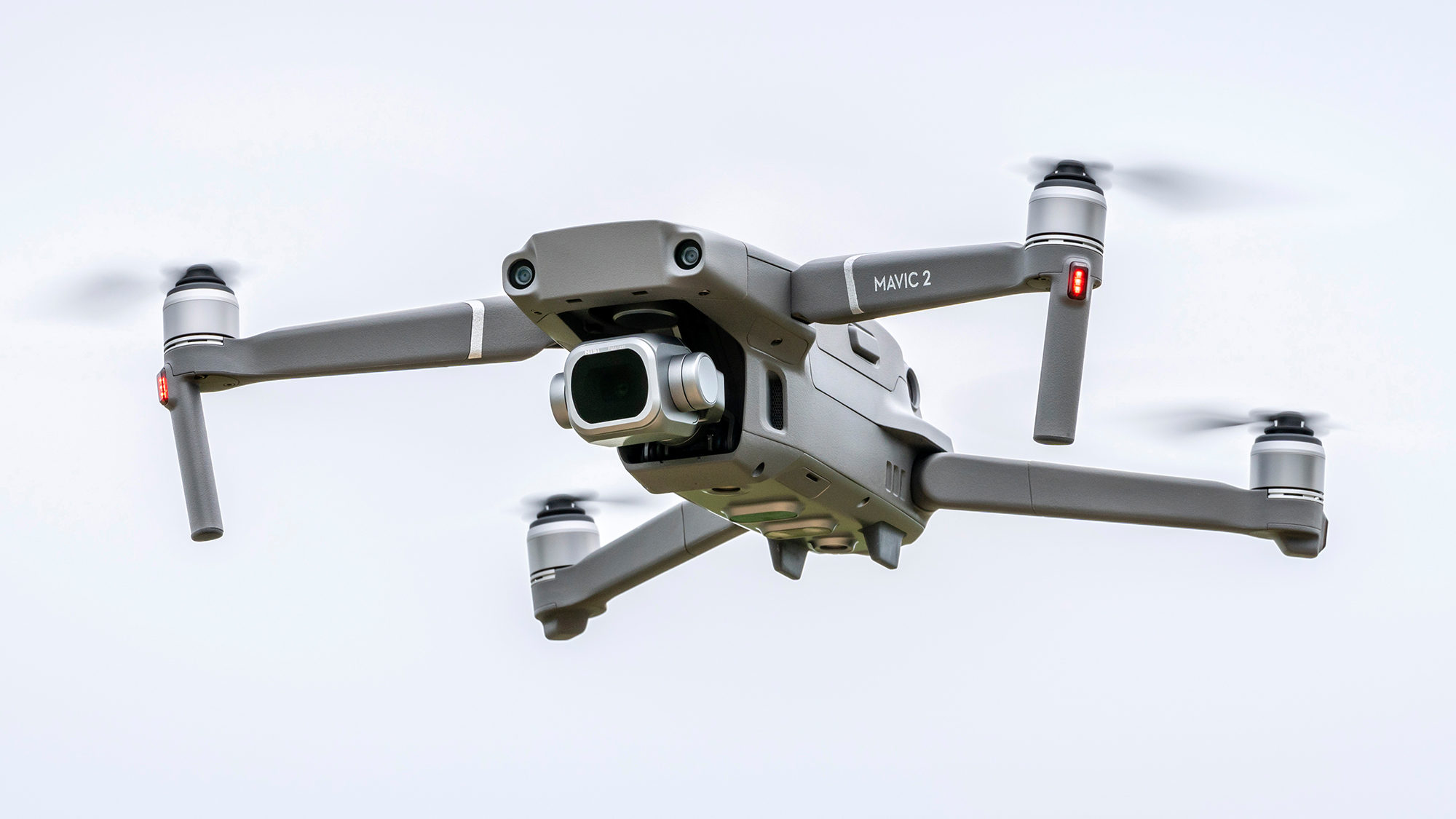 A DJI drone in flight in the sky