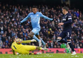 Manchester City’s Gabriel Jesus (centre) attempts a shot on goal during the Premier League match at the Etihad Stadium, Manchester. Picture date: Sunday November 28, 2021