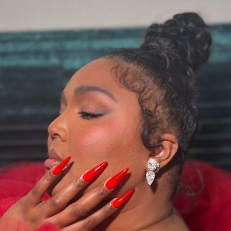Lizzo with top knot