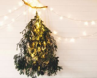 Christmas tree design made with hanging pine branches