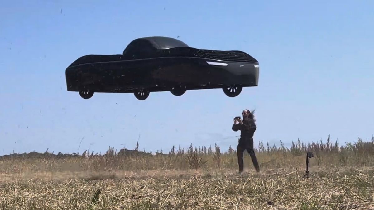 CEO of Alef near the flying car during test flight.