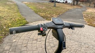 Segway Kickscooter ZT3 Pro parked on sidewalk