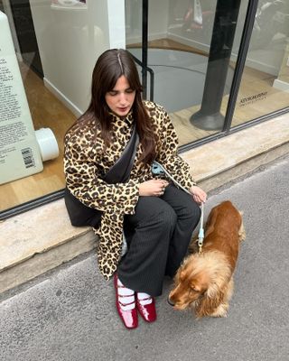 Influencer wears a leopard print coat