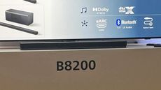 The Philips B8200 soundbar in front of a TV in a demo room