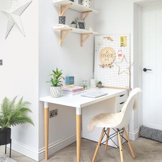 modern home office ideas, modern home office with Scandi styling, white space, white desk and shelving with blond wood, hardwood flooring, shelving