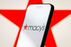 Macy's logo displayed on a smartphone
