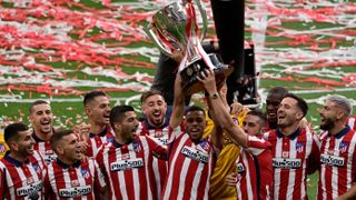 La Liga - Atletico Madrid´s players celebrate with the trophy at the Wanda Metropolitano stadium in Madrid on May 23, 2021 after winning the Spanish Liga Championship title.