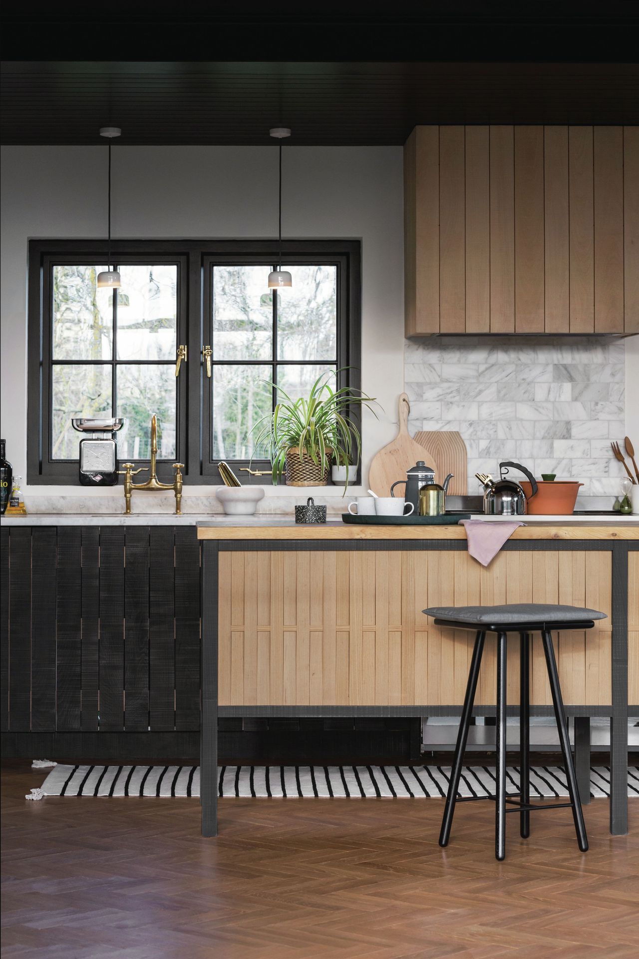 kitchen window treatment ideas Slat wood kitchen island and high cabinet teamed with white marble effect wall tiles, dark accents and wooden herringbone flooring