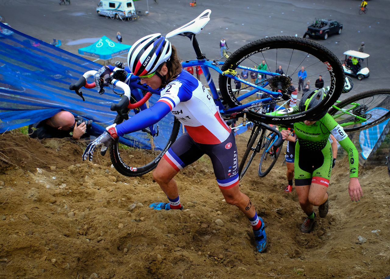 Caroline Mani (Raleigh Clement) fighting her way through deep sand on the run-up