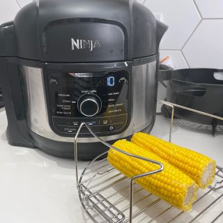 Ninja Foodi 9-in-1 Multi-Cooker with corn on the cob on rack