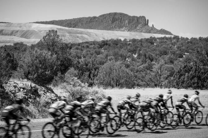 Riders pass by some of the scenes of the southwest