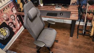 An overhead view of the Fractal Refine gaming chair from the side in front of a desk