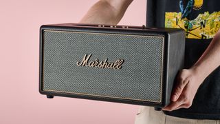 Man holding the Marshall Stanmore IV