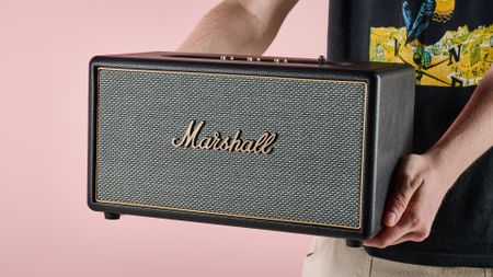 Man holding the Marshall Stanmore IV