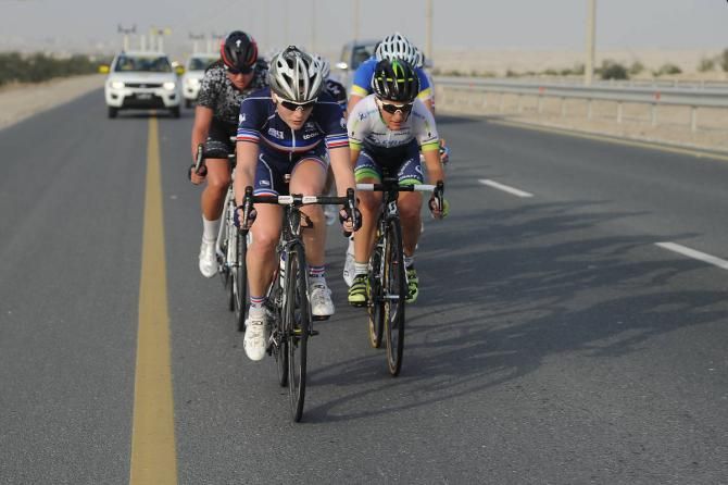 A small group fights the crosswinds