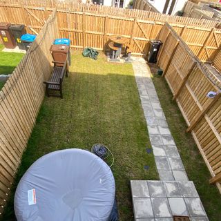 garden makeover wooden fencing and grass