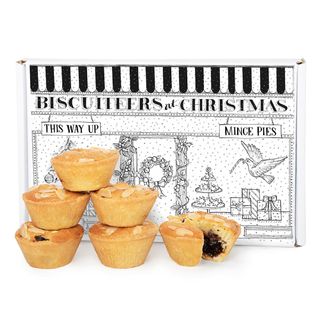 6 Biscuiteers mince pies next to their box