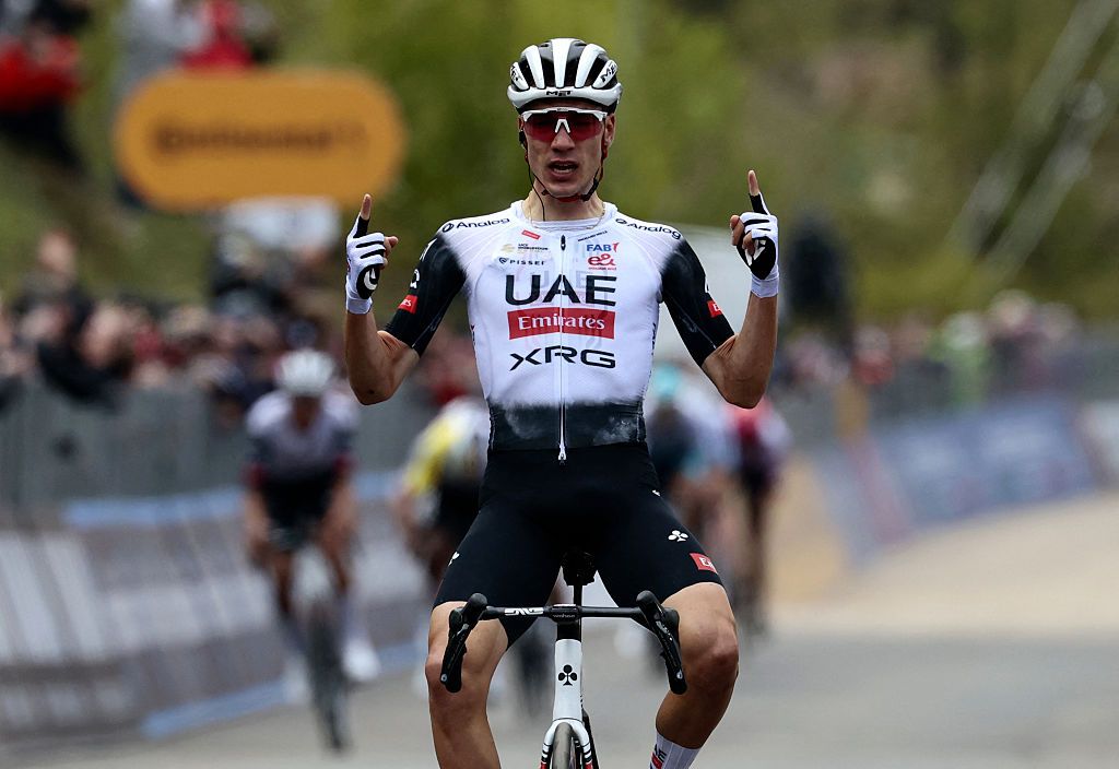 UAE Team Emirates XRG's Spanish rider Juan Ayuso celebrates after victory as he crosses the finish of the 7th stage of the 108th Giro d'Italia cycling race 168kms from Castel di Sangro to Tagliacozzo on May 16, 2025. (Photo by Luca Bettini / AFP)