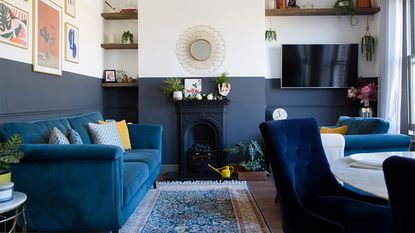 blue and white painted living room with blue sofa