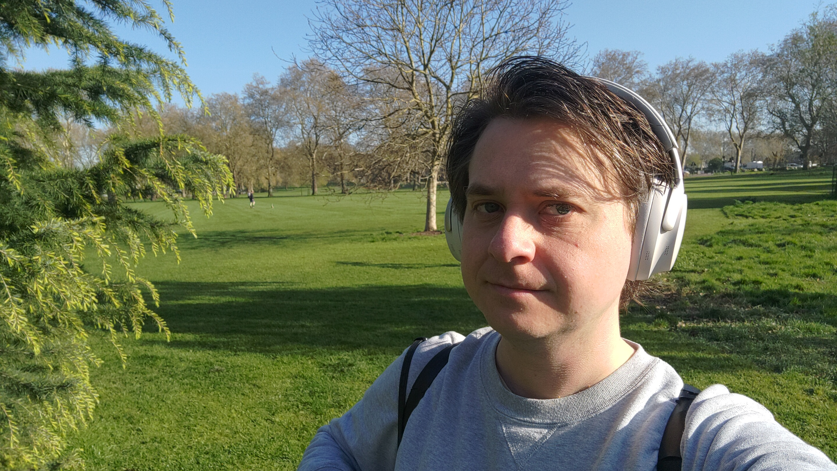 Photograph of man wearing Bose QuiteComfort Ultra Headphones