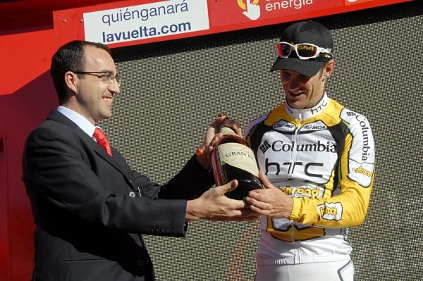 Greg Henderson gets the champagne for stage winner.