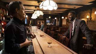 Kevin Bacon and Aldis Hodge at a bar in City on a Hill