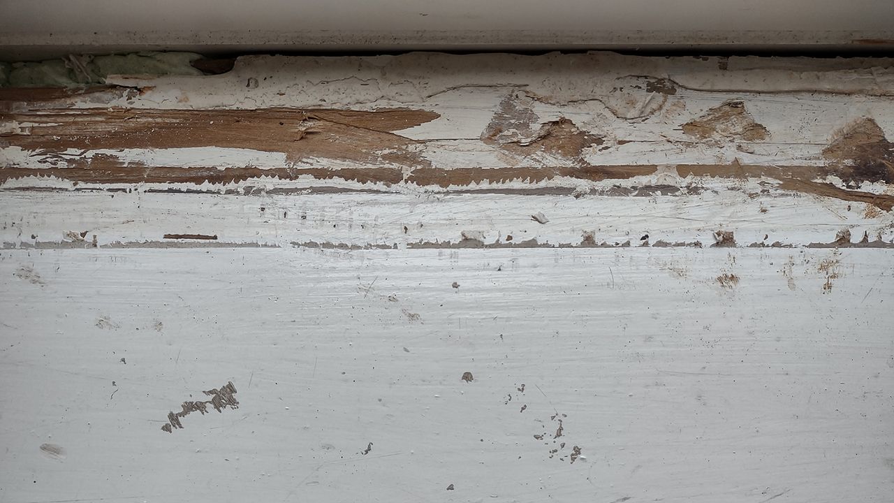 peeling paint on window sill