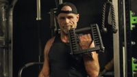 Shawn Michaels lifting weights in The Heartbreak Kid: Becoming Shawn Michaels