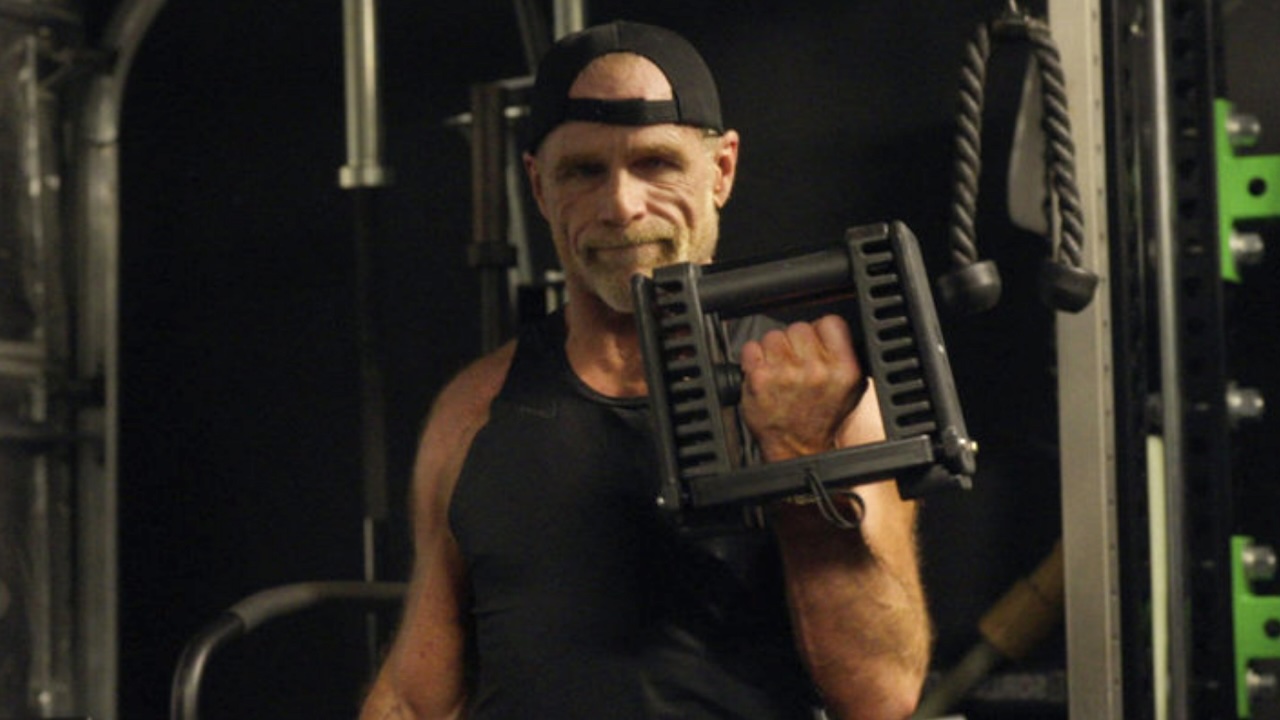 Shawn Michaels lifting weights in The Heartbreak Kid: Becoming Shawn Michaels