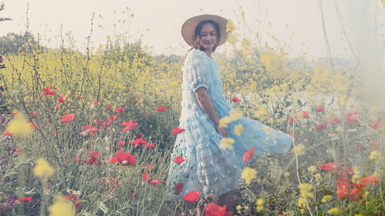 Full Length Of Woman Standing On Field - stock photo