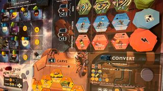 A look at the full Apiary board, with numerous ability and planet tiles laid out across it