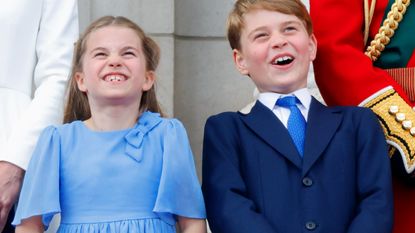 Princess Charlotte of Cambridge and Prince George of Cambridge watch a flypast from the balcony of Buckingham Palace during Trooping the Colour on June 2, 2022 in London, England.