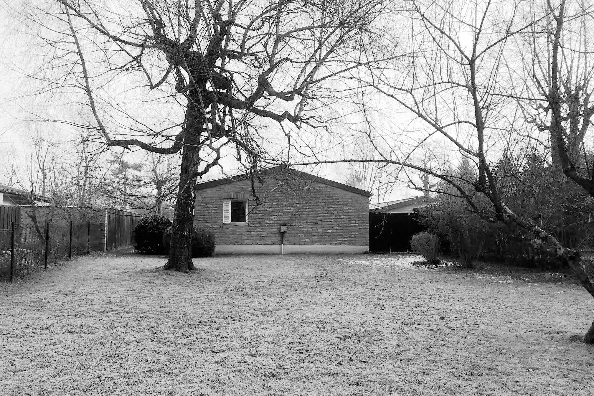 The original house before demolition and reconstruction