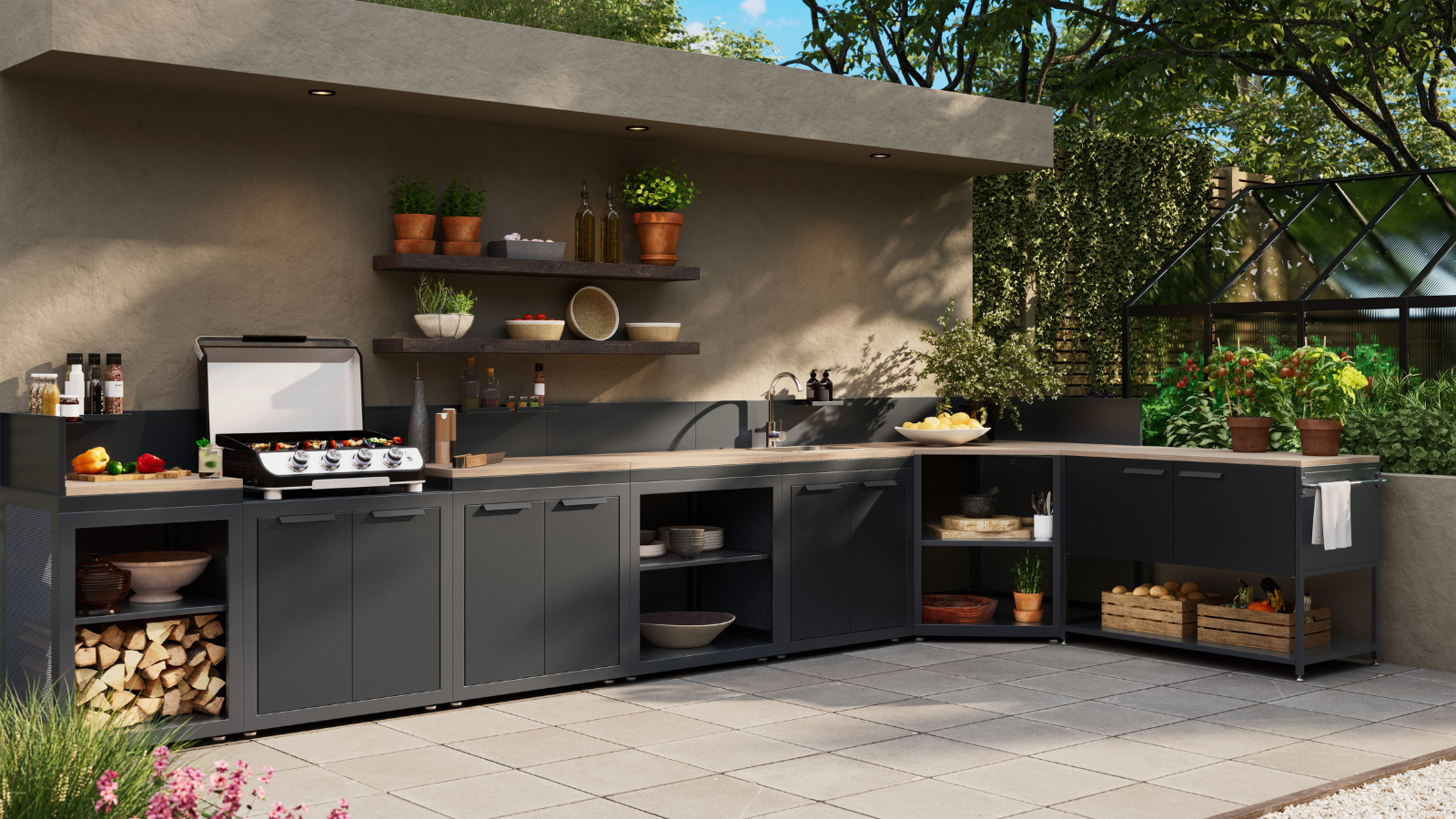 Outdoor kitchen with dark grey cabinets and built in shelving and cooker