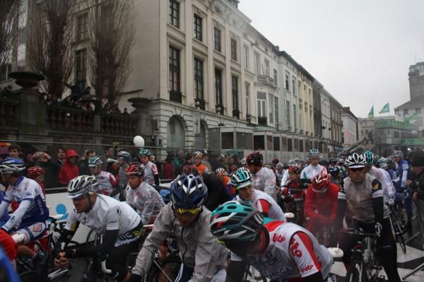 Riders huddle together at the start in Gent