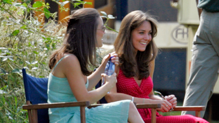 Kate Middleton and her sister Pippa Middleton watch Prince William compete in the Chakravarty Cup charity polo match at Ham Polo Club on June 17, 2006 in Richmond, England