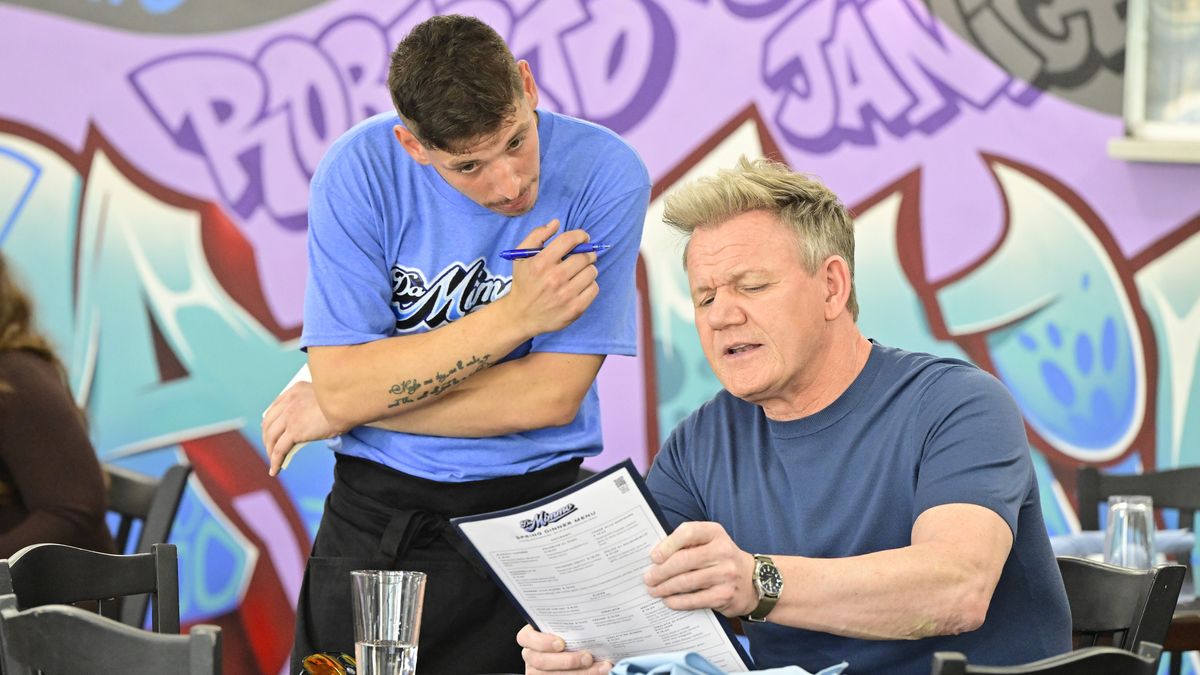 Gordon Ramsay inspects the menu at Da Mimmo in Kitchen Nightmares season 8