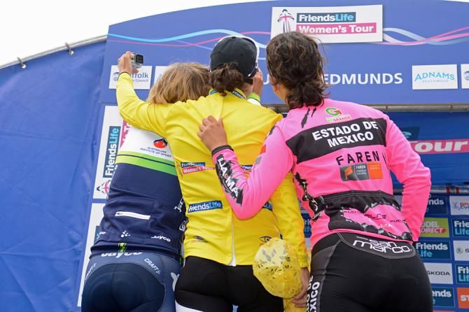 The podium finishers take a "selfie" on the podium
