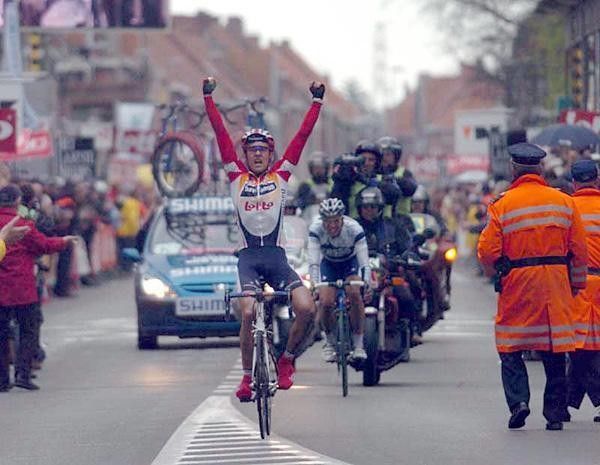 Nico Mattan (Davitamon-Lotto) is a happy man as he crosses the line to win Gent-Wevelgem