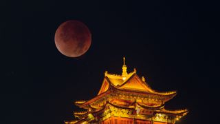 A photograph of the "blood moon" above Jiujiang in China. 