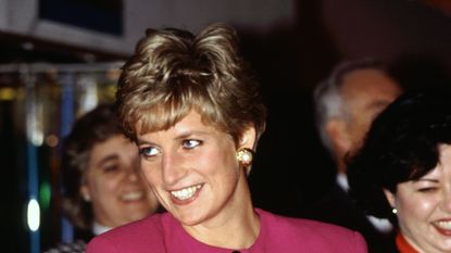 CANADA - OCTOBER 24: Diana, Princess of Wales, smiling during her visit to Sudbury, part of her official tour of Canada, The Princess is wearing a pink suit designed by fashion designer Paul Costelloe (Photo by Tim Graham Photo Library via Getty Images)