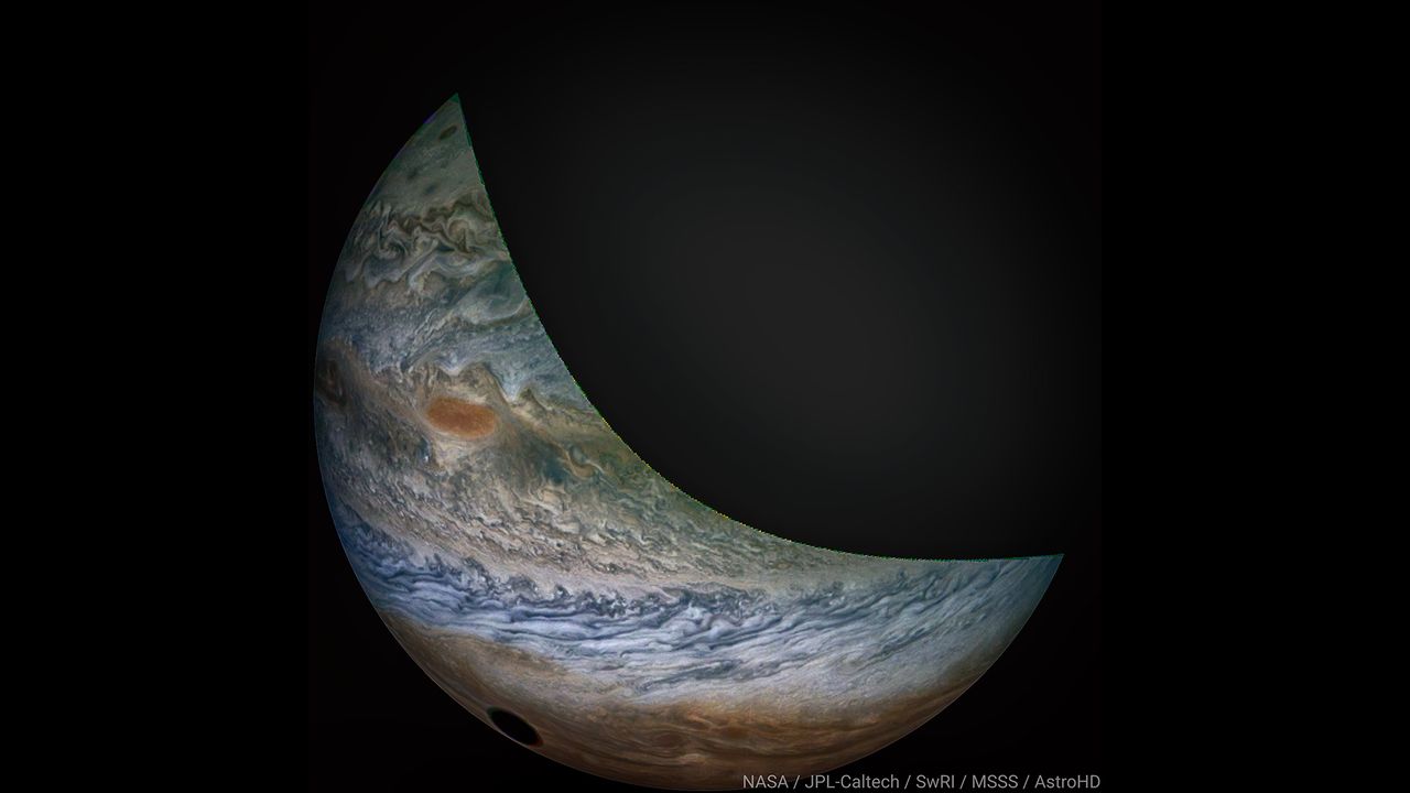 A view of Io's shadow on the surface of Jupiter captured by NASA's Juno probe.