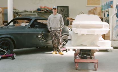 Daniel Arsham pictured in his studio with new car