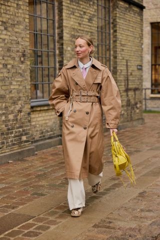 Photo of Scandi woman in winter street style during Copenhagen Fashion Week Fall-Winter 2025.