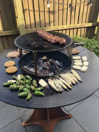 food cooking on an outdoor grill