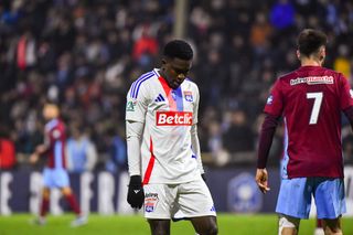Lyon star Ernest Nuamah looks on after his side were dumped out of the French Cup by fifth-tier side Bourgoin-Jallieu