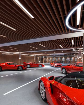 Red Ferraris beneath wood ceiling in underground Garage Deluxe concept